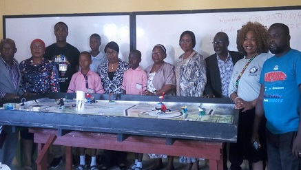 Katrina Adams, FIRST AmeriCorps VISTA member for FLL (2nd right); Titilayo Oguntola (Mrs), director and head of department, Co-Curricular, Science and Technology, Education District VI (5th right), flanked by students, Coderina and FLL officials during official launch of FLL 2016/2017 program in Lagos on Thursday.